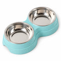 Double gamelle en inox sur support pour chien et chat — fond blanc