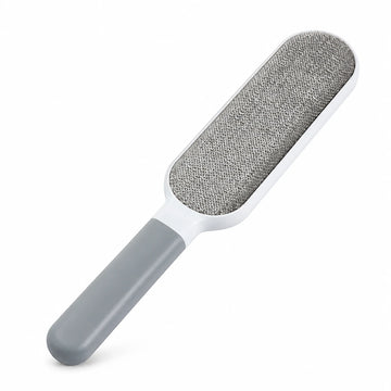 Brosse anti-poils double face pour textiles — fond blanc