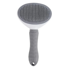 Brosse autonettoyante grise pour chien et chat, vue des picots