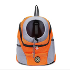 Sac de transport orange pour petit chien et chat sur fond blanc